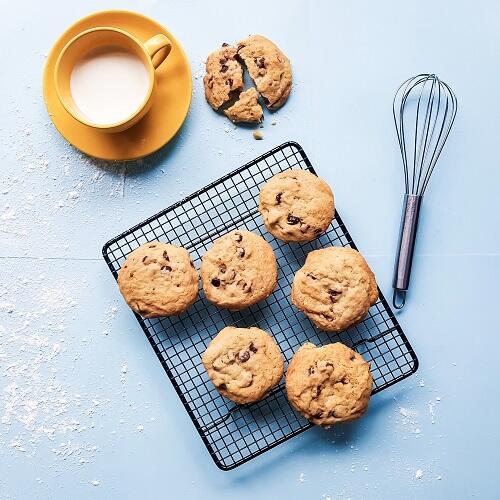 wire rack with chocolate chip cookies